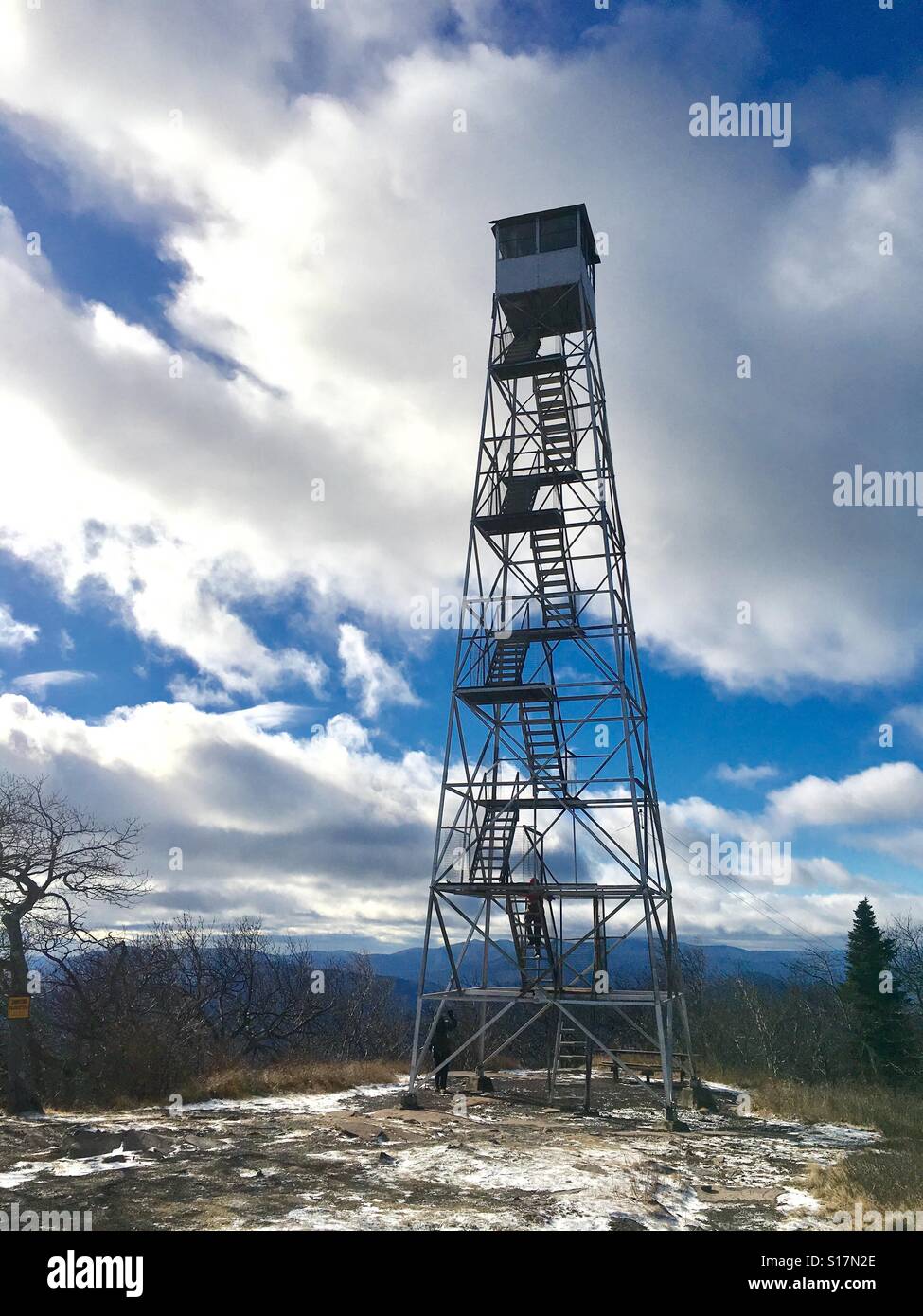 Fire tower on top of mountain trail Stock Photo