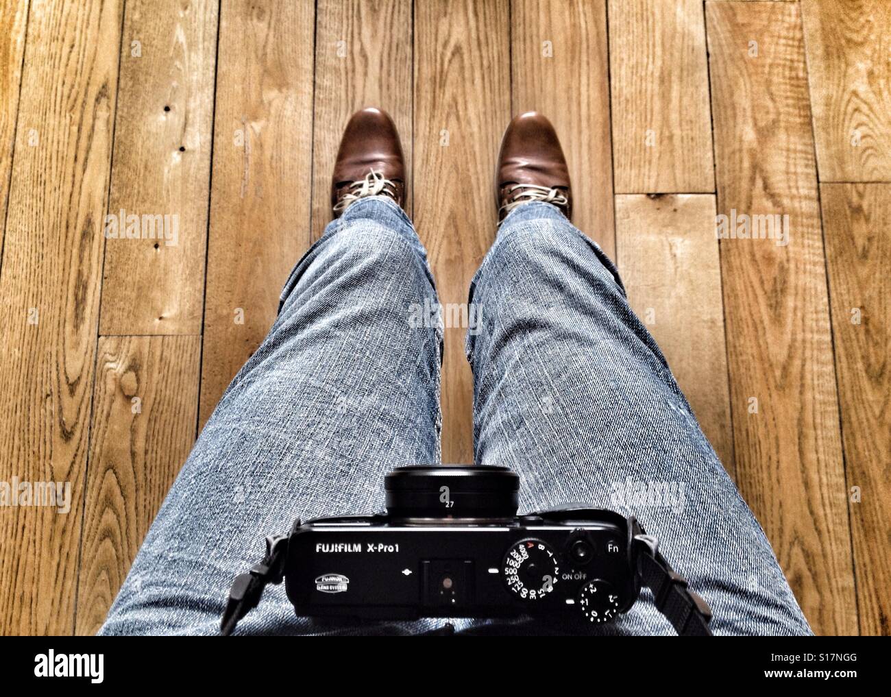 Man wearing a camera on his belly - Smartphone Captured Stock Image