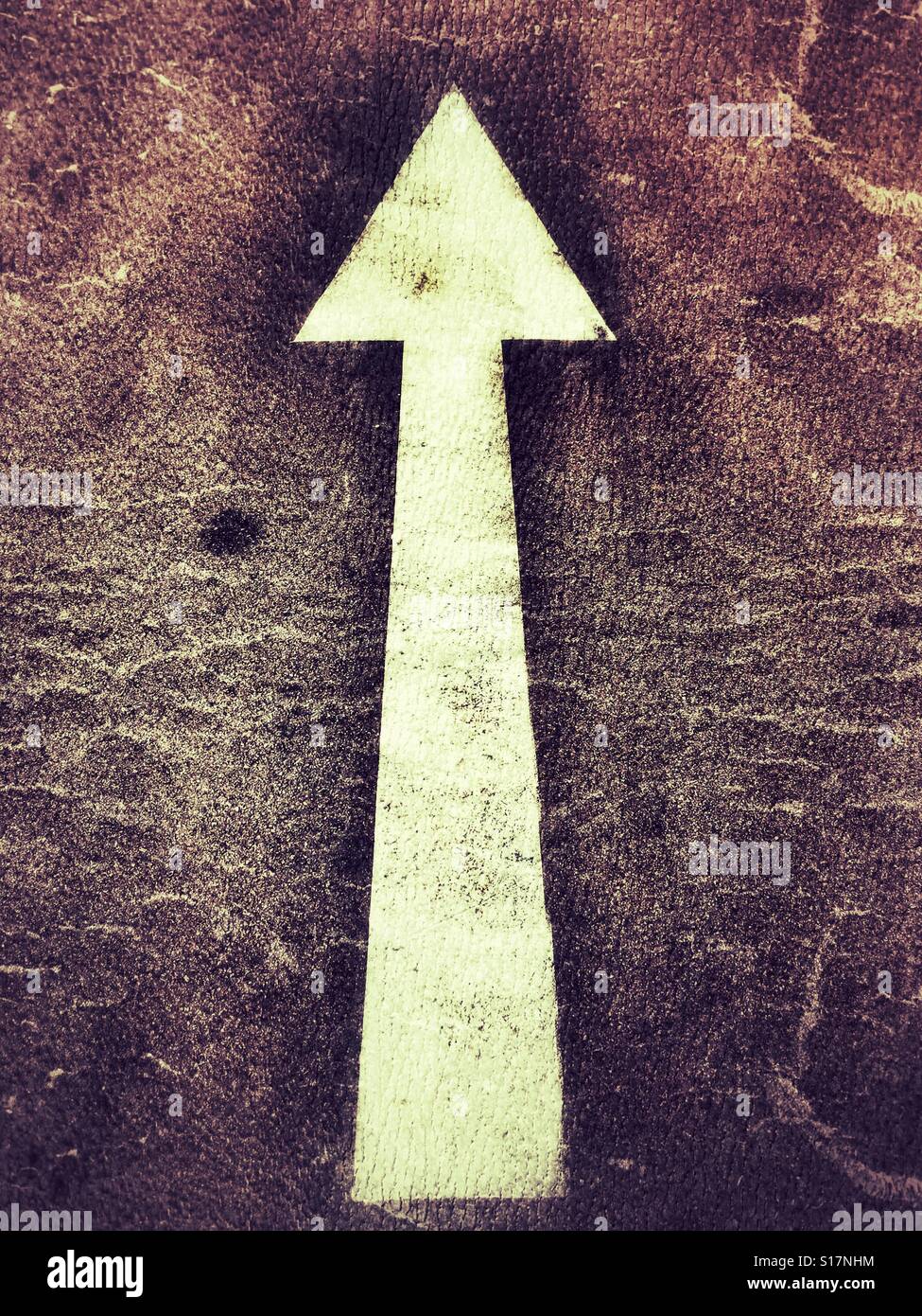 Arrow on the road. - Smartphone Captured Stock Image