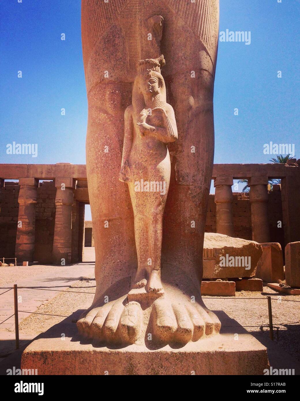 Queen Nefertari at the feet of pharaoh Rammesses||, Luxor, Egypt - Smartphone Captured Stock Image