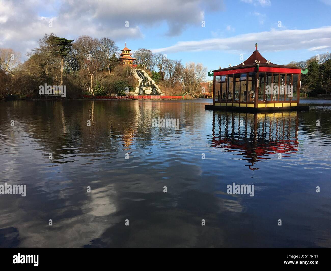 Lake in a park with cascade, pagoda and Chinese theme - Smartphone Captured Stock Image