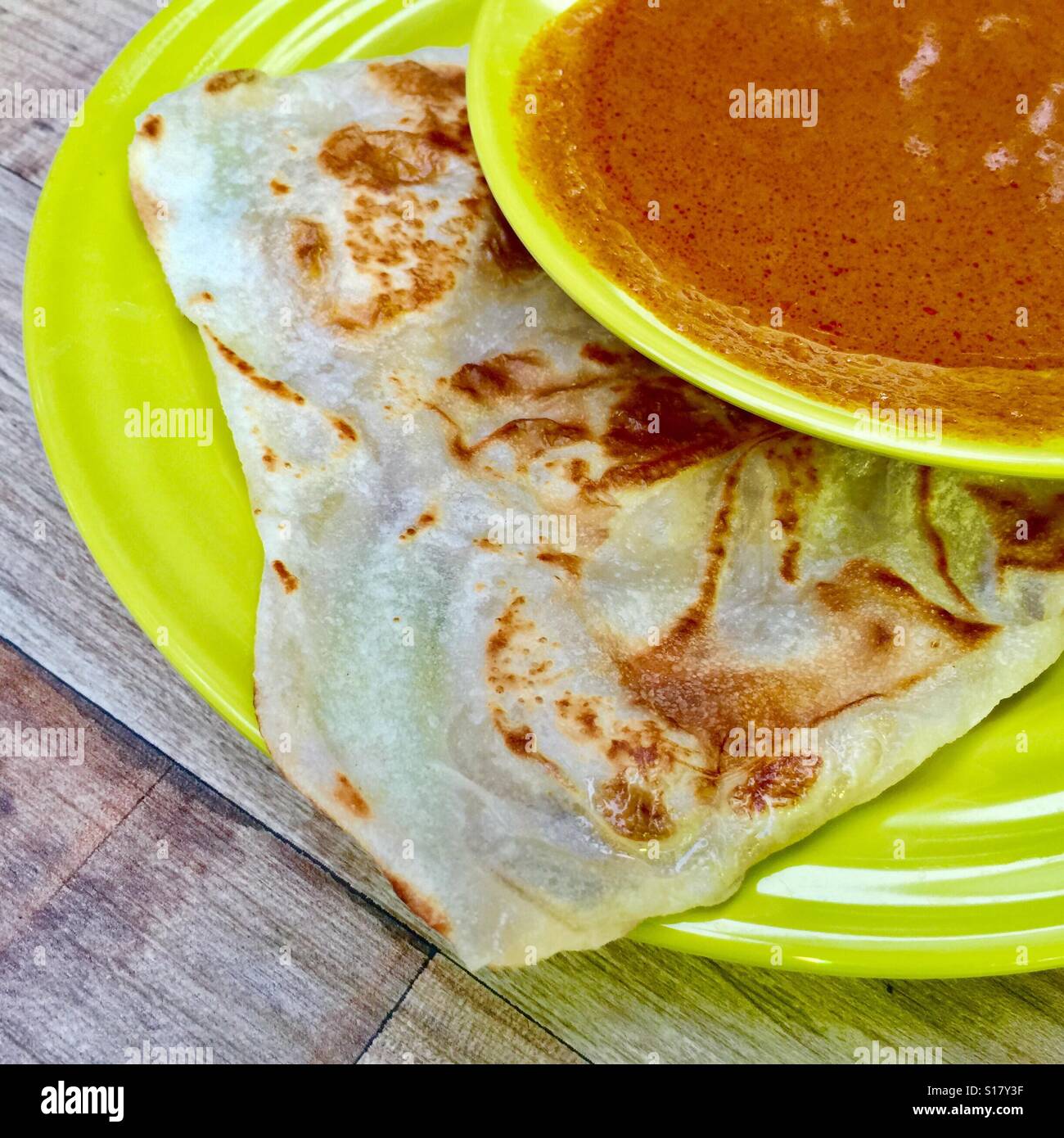 Indian bread ( Roti Prata) served with Indian curry, Singapore Stock ...