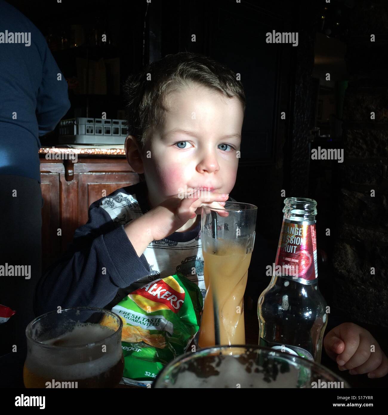 Children drinking in public houses Stock Photo