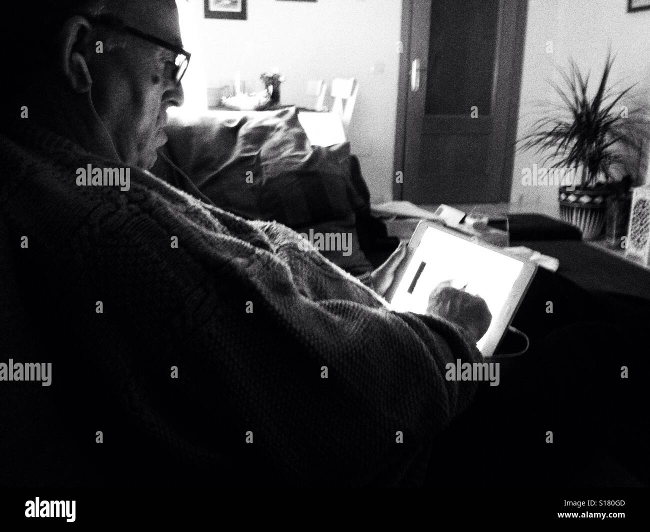 Man using tablet - Smartphone Captured Stock Image