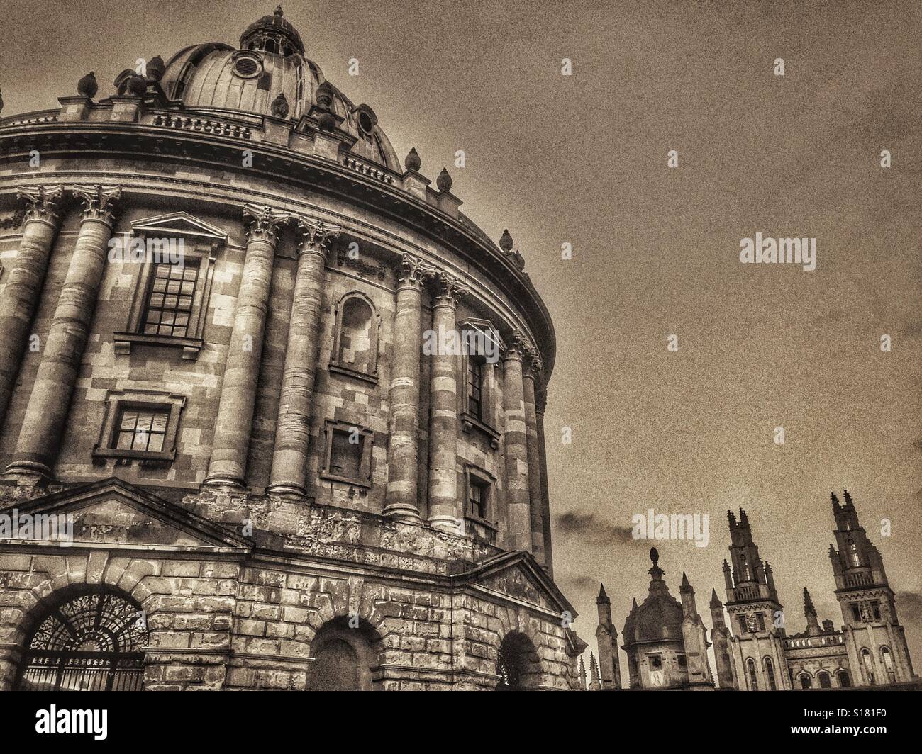 A HDR image of the famous Neo-Classical circular Radcliffe Camera building & All Souls College - both a part of Oxford University in England. The Radcliffe Camera building is used as a library. © C.H. - Smartphone Captured Stock Image