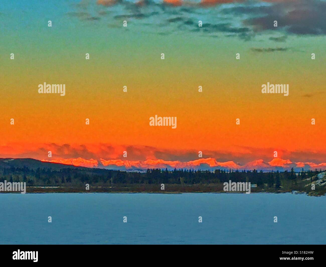 Glenmore Reservoir and the Canadian Rocky Mountains in winter, Alberta, Canada - Smartphone Captured Stock Image