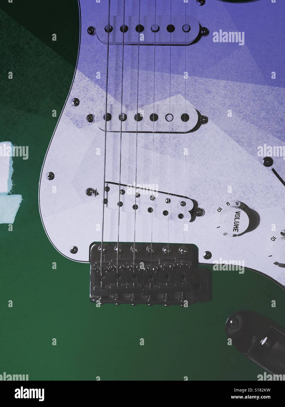 Green & white Fender Stratocaster electric guitar Stock Photo