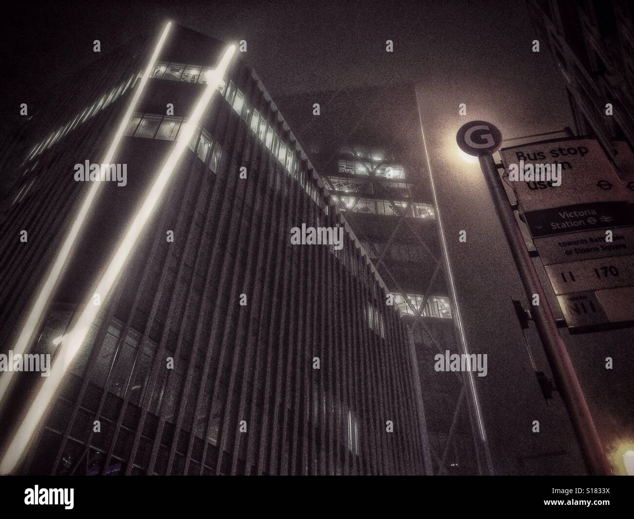 Modern architecture at Victoria in London at night. - Smartphone Captured Stock Image