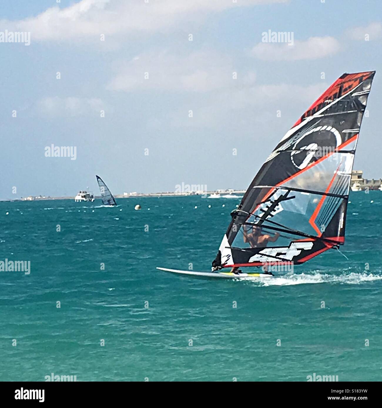 Wind sailing at Silver Sands beach in Jeddah Saudi Arabia Stock Photo