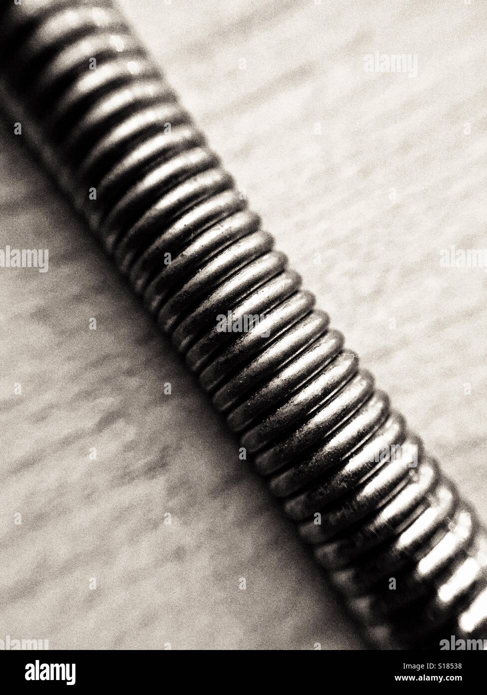 Coils of a tremolo bridge spring from a guitar Stock Photo