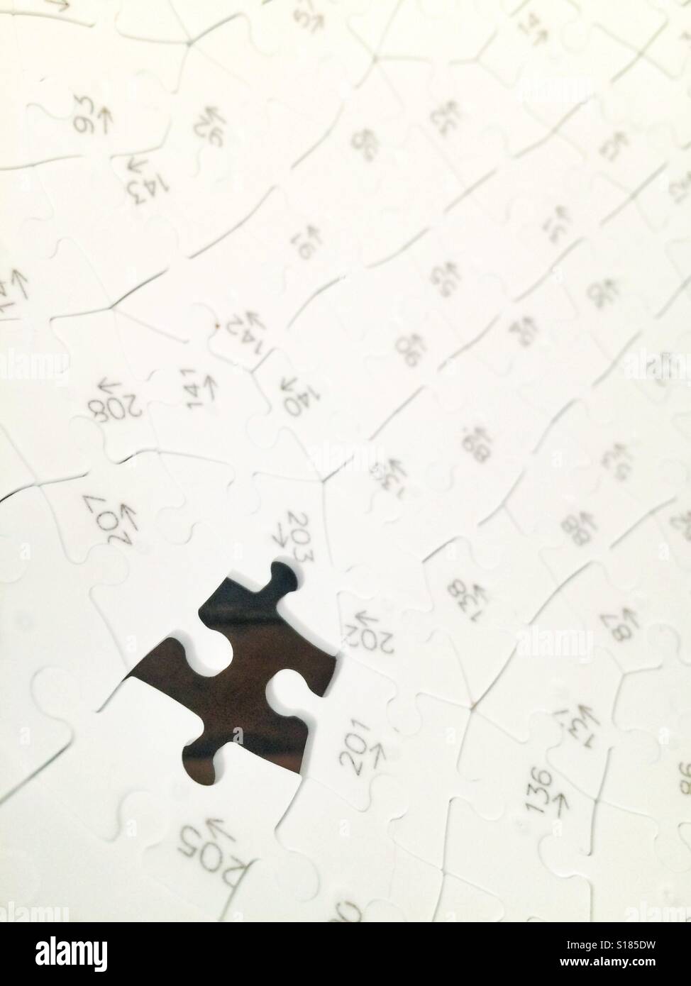 The missing piece of a jigsaw Stock Photo