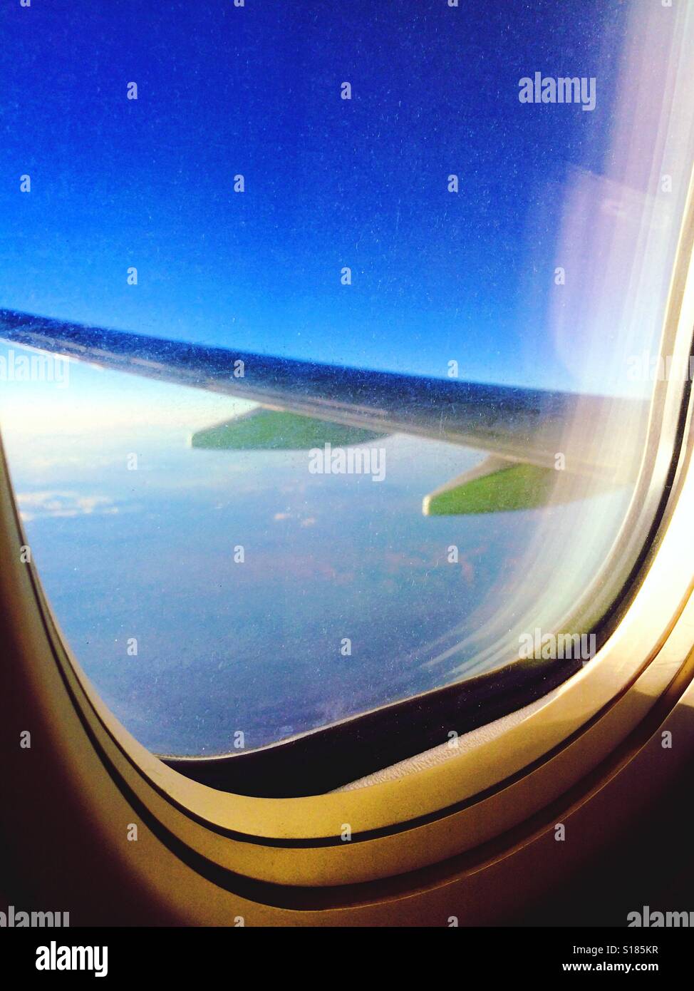 View from airplane porthole. Stock Photo
