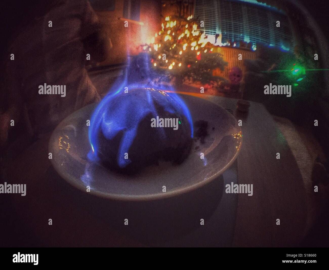 Christmas pudding on fire Stock Photo Alamy