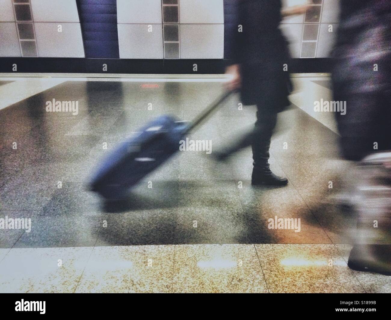 People rushing in an airport - Smartphone Captured Stock Image