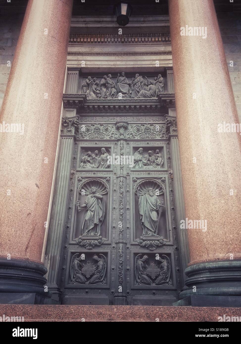 Columns and carved door of Saint Isaac's Church on Saint Petersburg, Russia - Smartphone Captured Stock Image