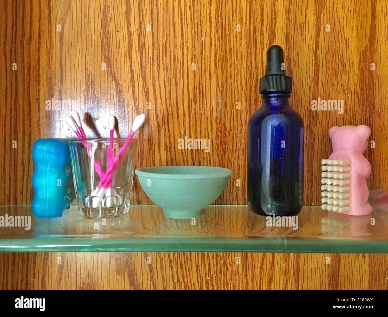 Medicine cabinet shelf  row of items - Smartphone Captured Stock Image
