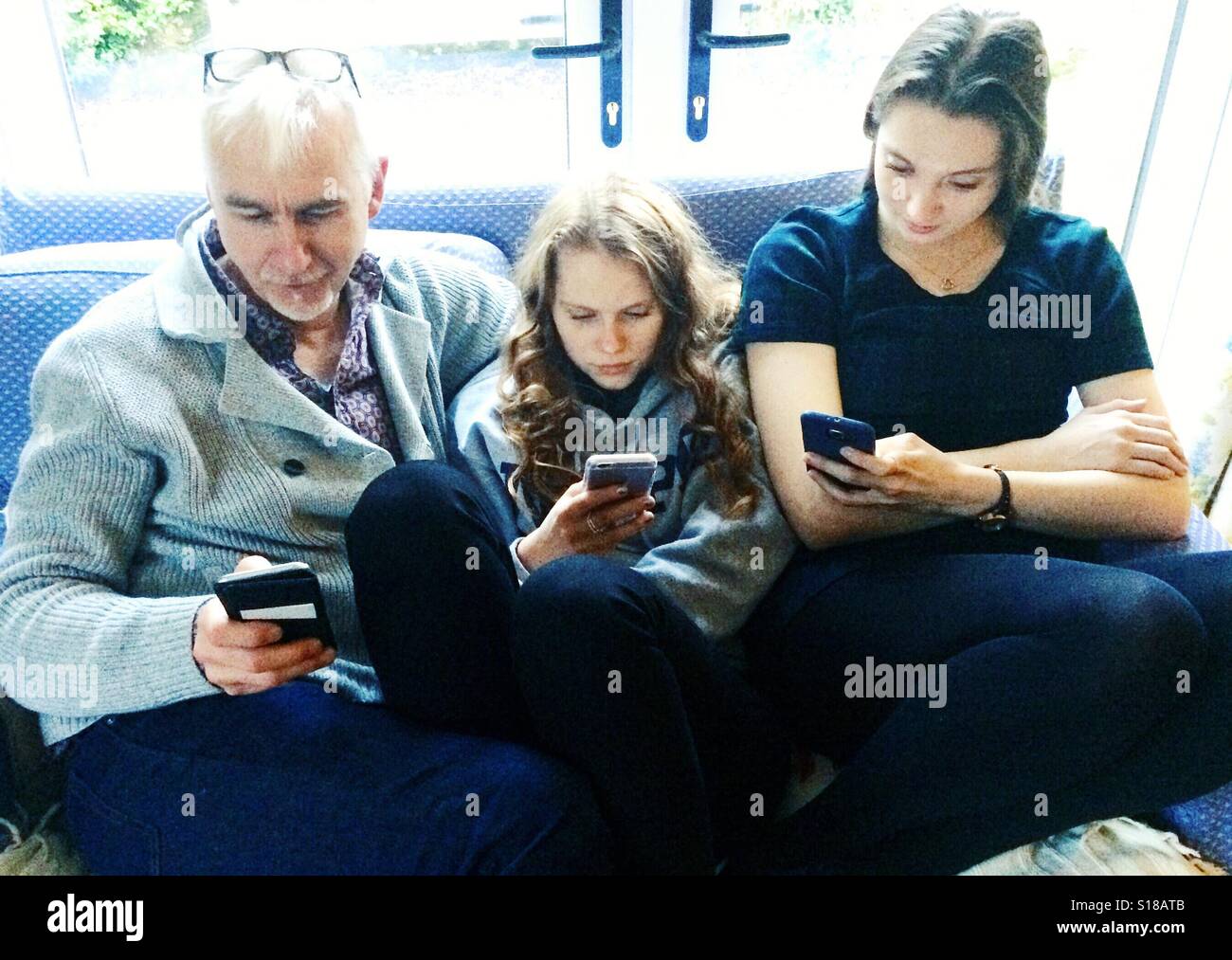 All on the phone - Smartphone Captured Stock Image
