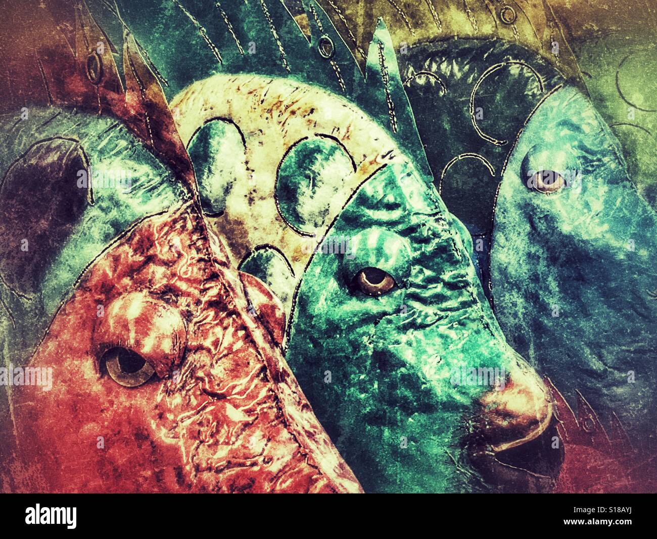 Painted metal fish decorations - Smartphone Captured Stock Image
