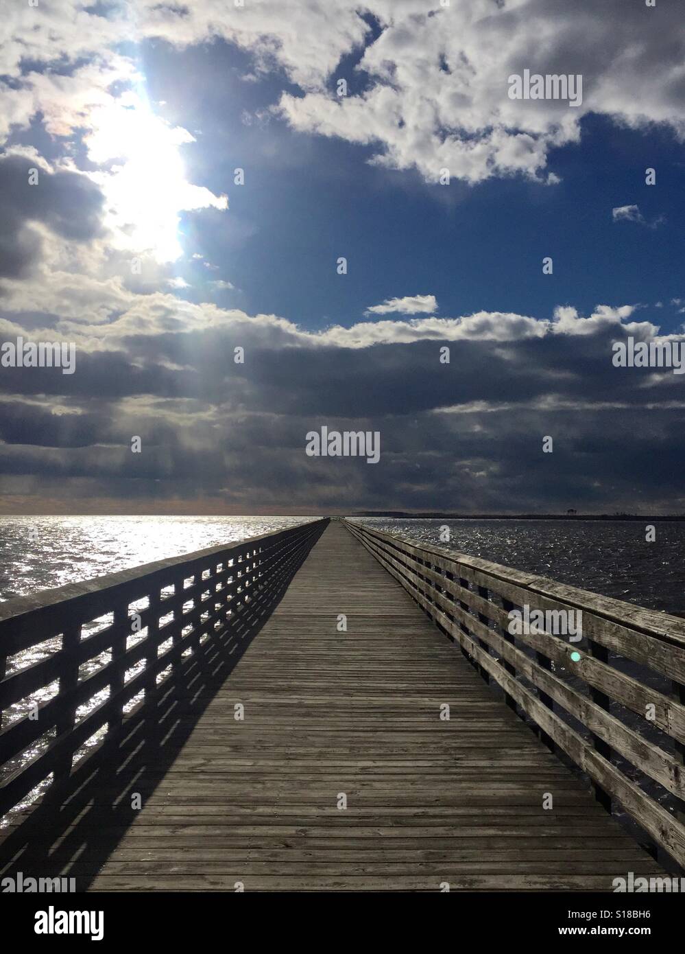 A fishing pier juts out into Pamlico Sound Stock Photo