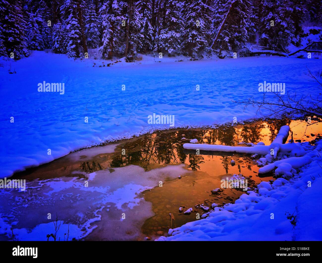 Open water and reflections in Fish Creek, Calgary, Alberta, Canada - Smartphone Captured Stock Image