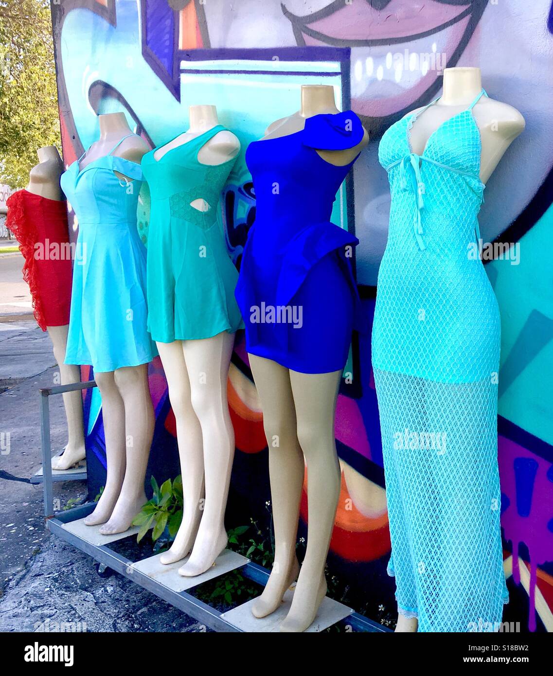Mannequin clothing display and Street art - Smartphone Captured Stock Image