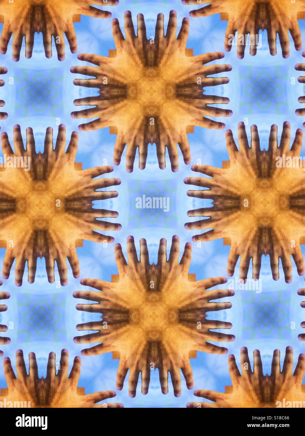 An abstract artistic image of a design made from hands and fingers Stock Photo