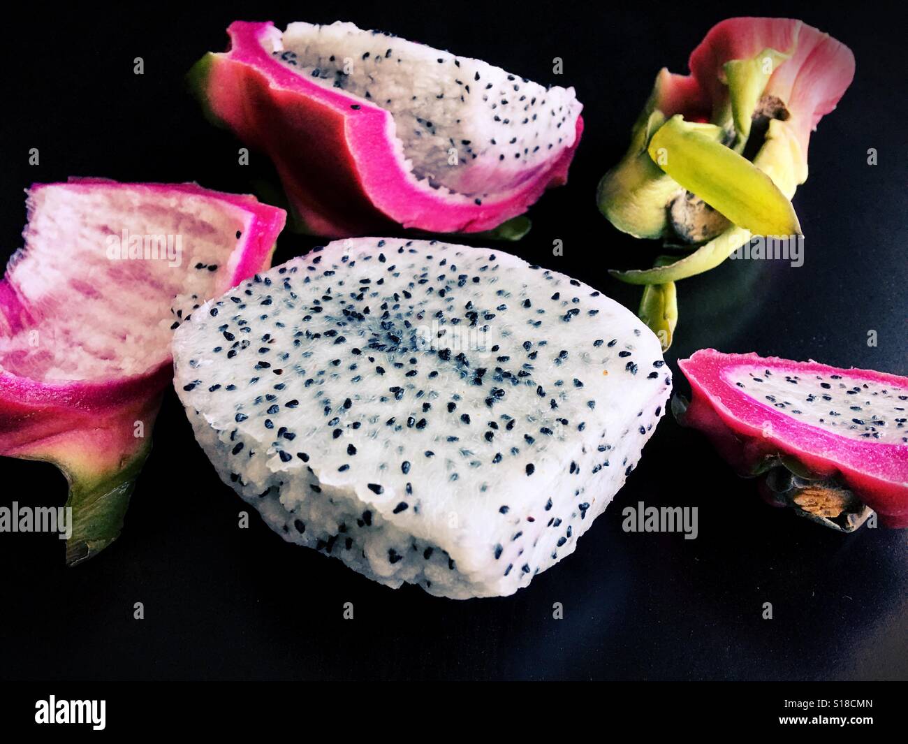 A cut open dragon fruit Stock Photo Alamy