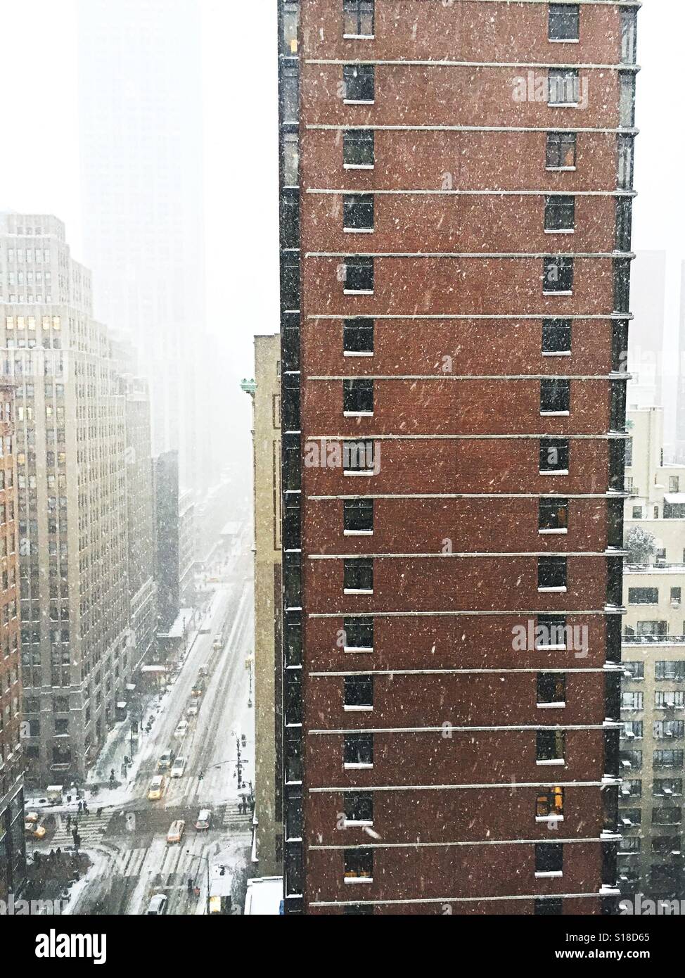 Midtown Manhattan snowfall, New York City, USA - Smartphone Captured Stock Image