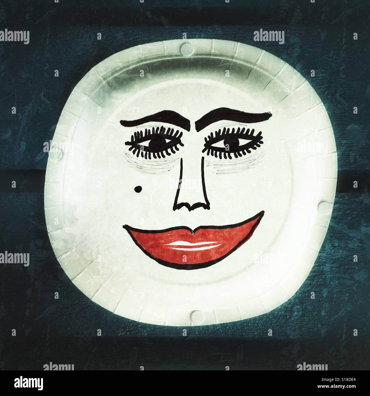 Face drawn on a paper plate Stock Photo Alamy