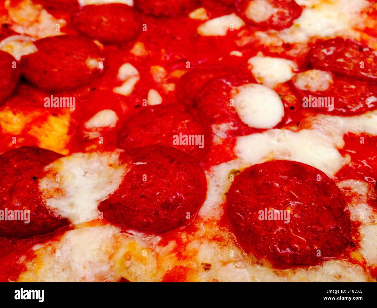 Pepperoni and mozzarella cheese pizza - Smartphone Captured Stock Image