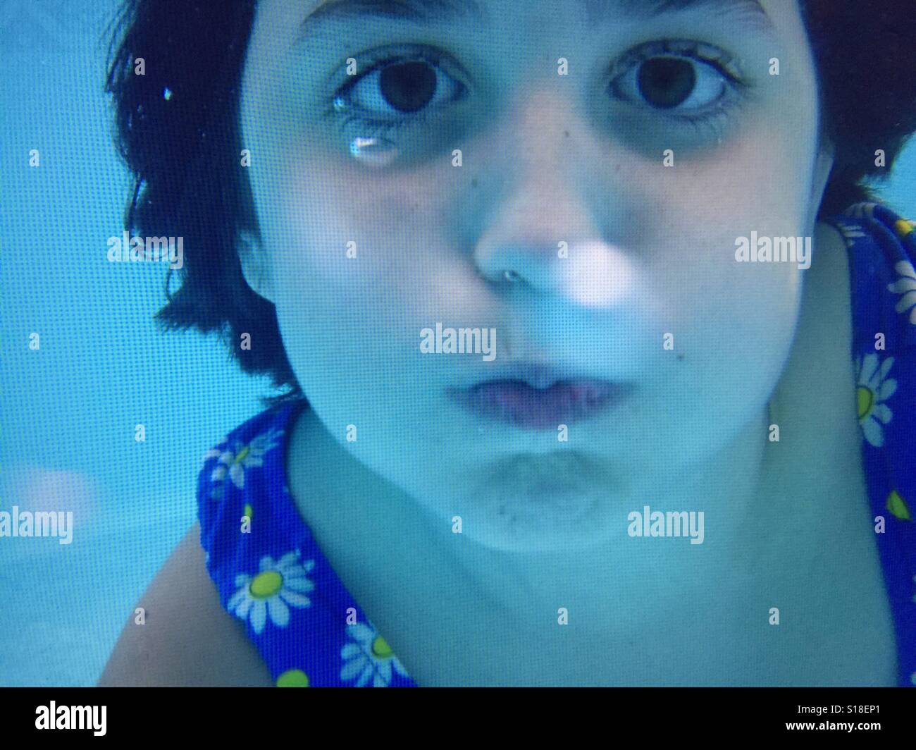 A girl holding her breath underwater Stock Photo 310588489 Alamy