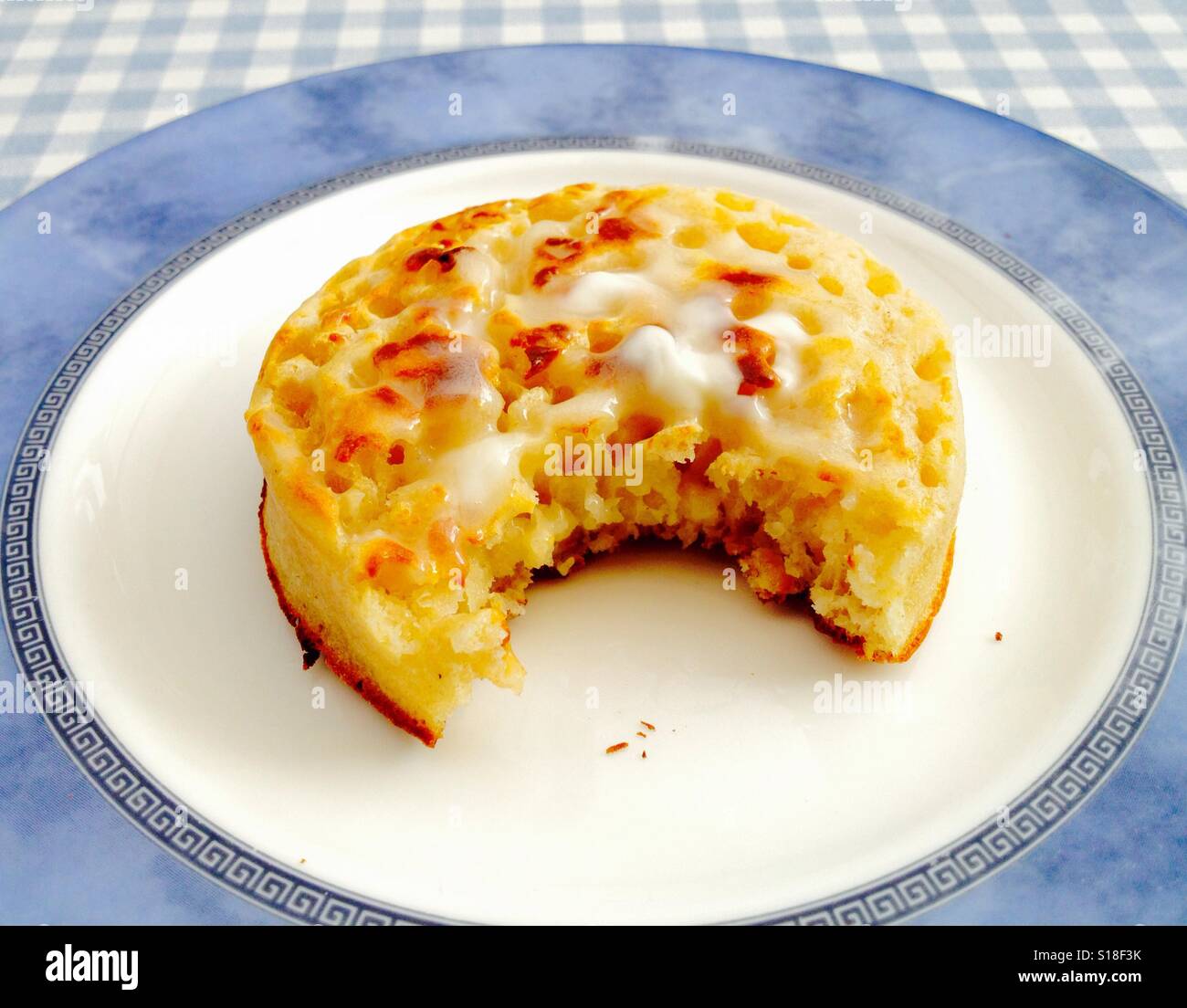 Hot buttered crumpet - Smartphone Captured Stock Image