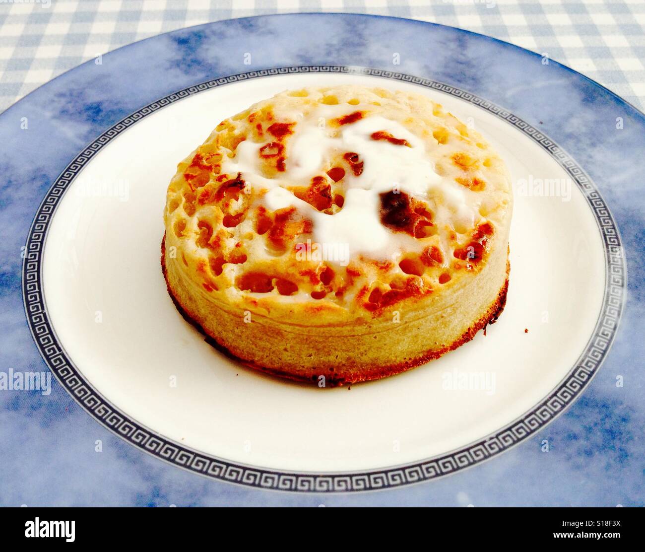 Buttered crumpet - Smartphone Captured Stock Image