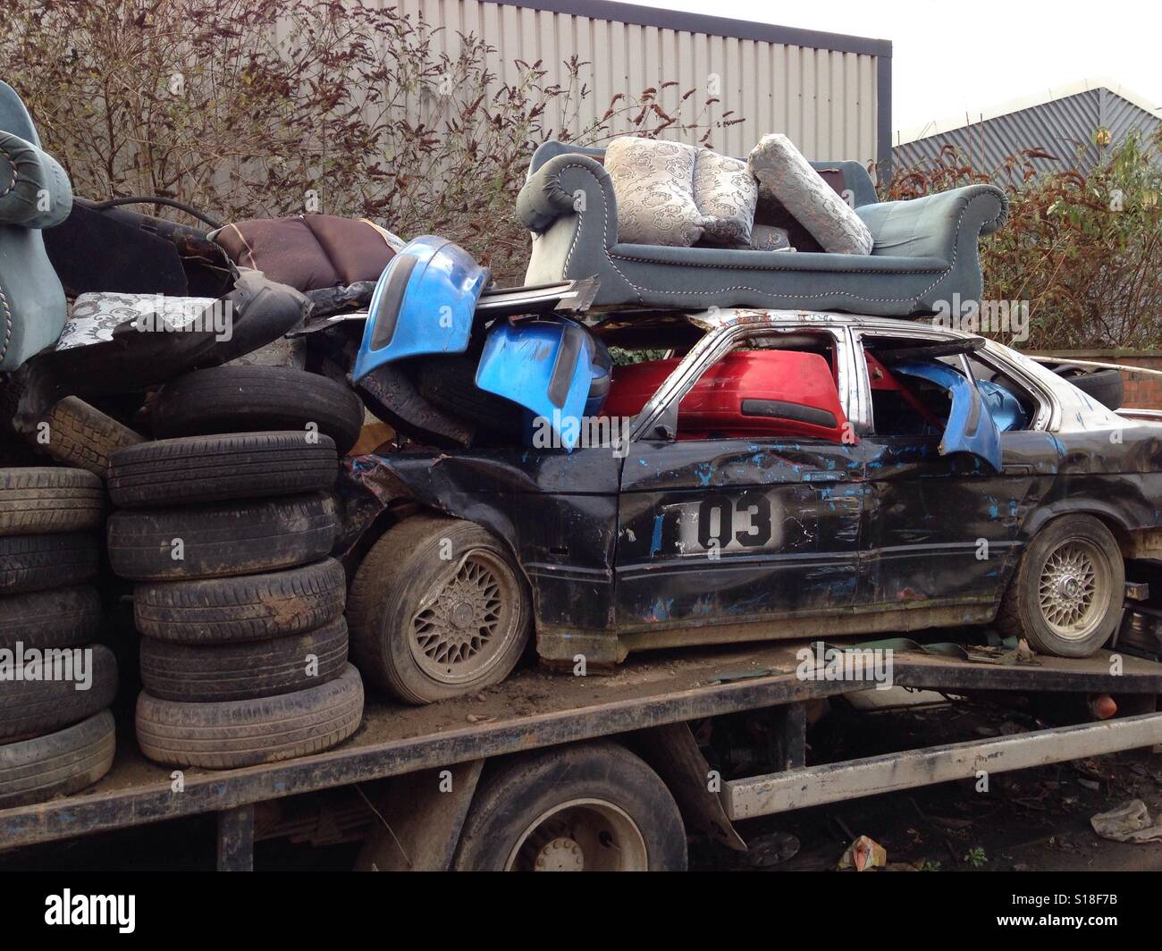 Sofa on top of stock car - Smartphone Captured Stock Image