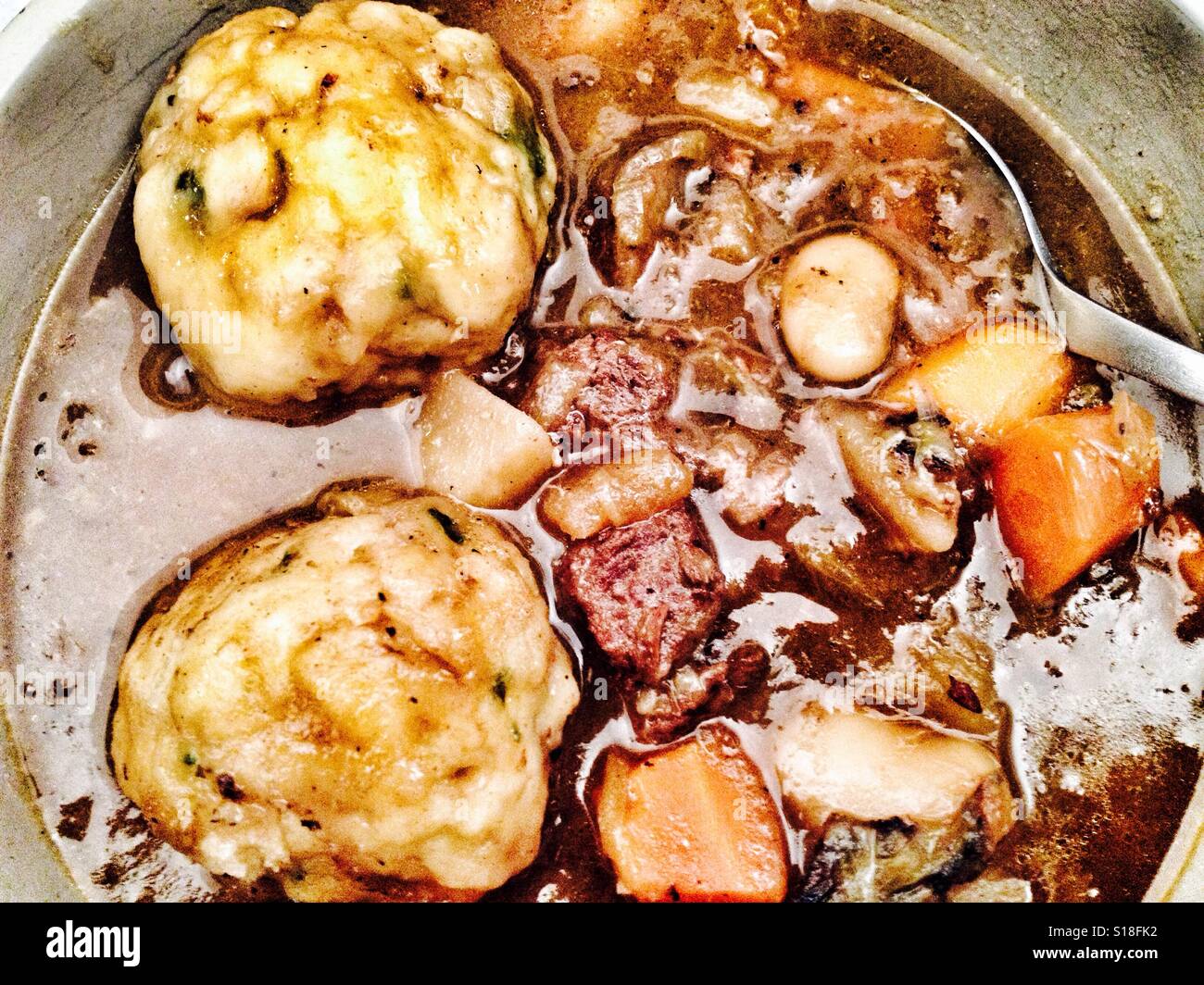 Beef stew and dumplings Stock Photo Alamy