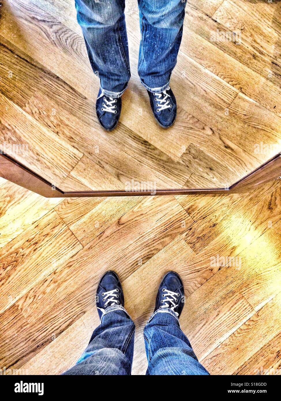 Standing in front of mirror, reflection - Smartphone Captured Stock Image