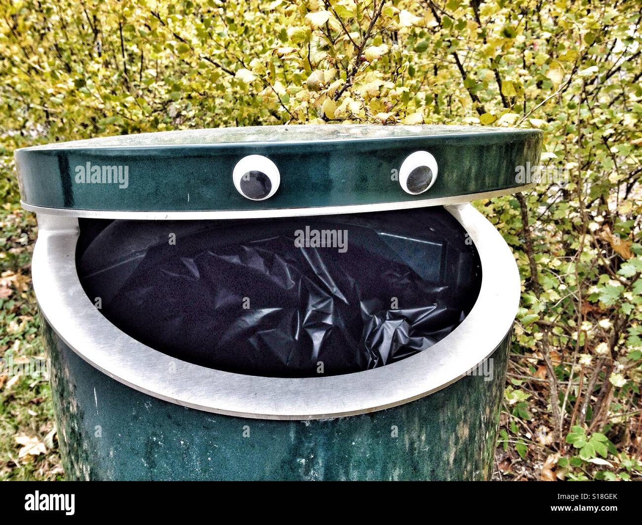 Smiley trash can with eyes Stock Photo Alamy