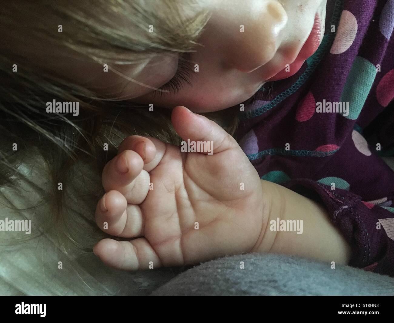 Toddler sleeping during a nap. Stock Photo