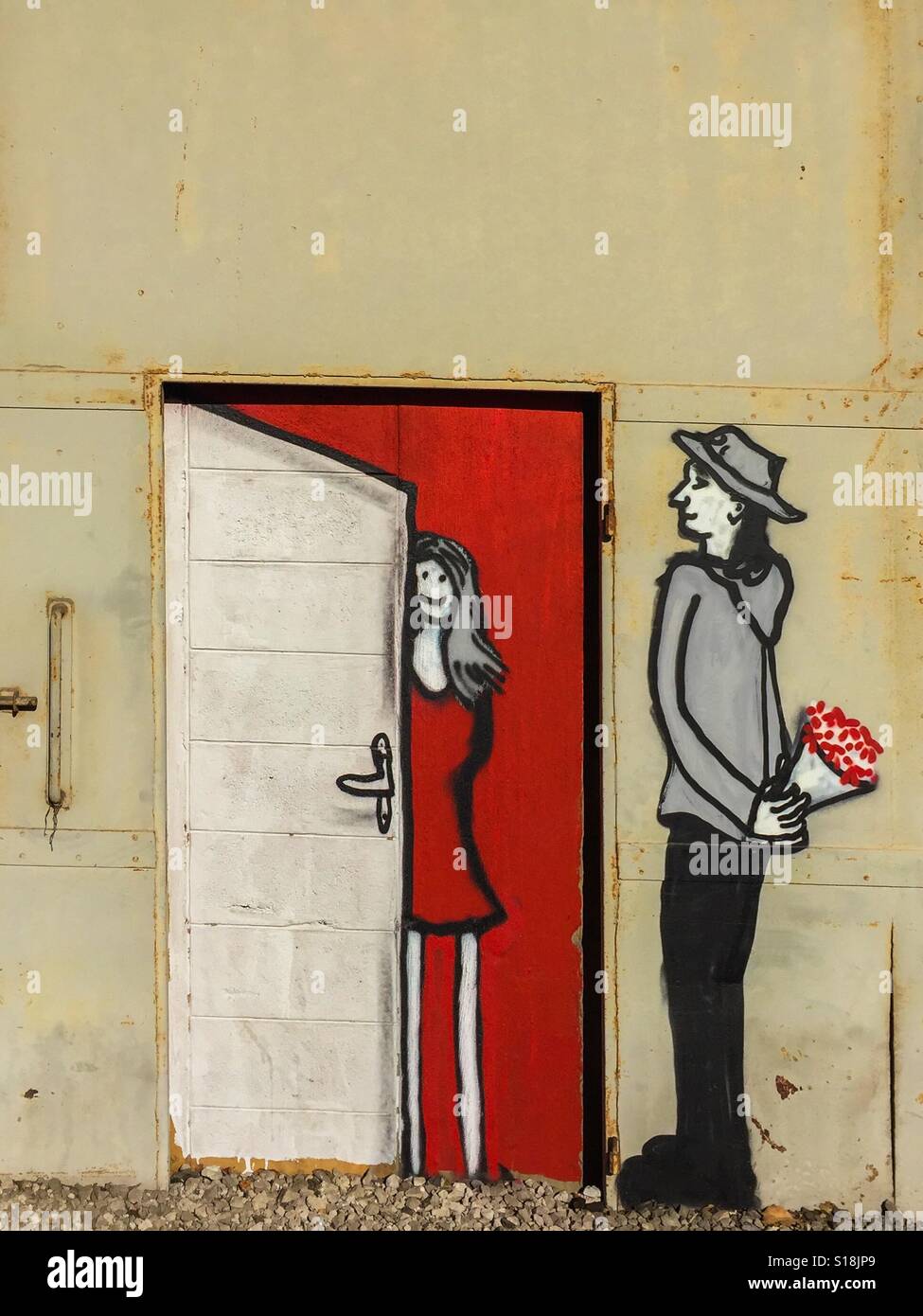 Street art - Boy bringing flowers to girl - Smartphone Captured Stock Image