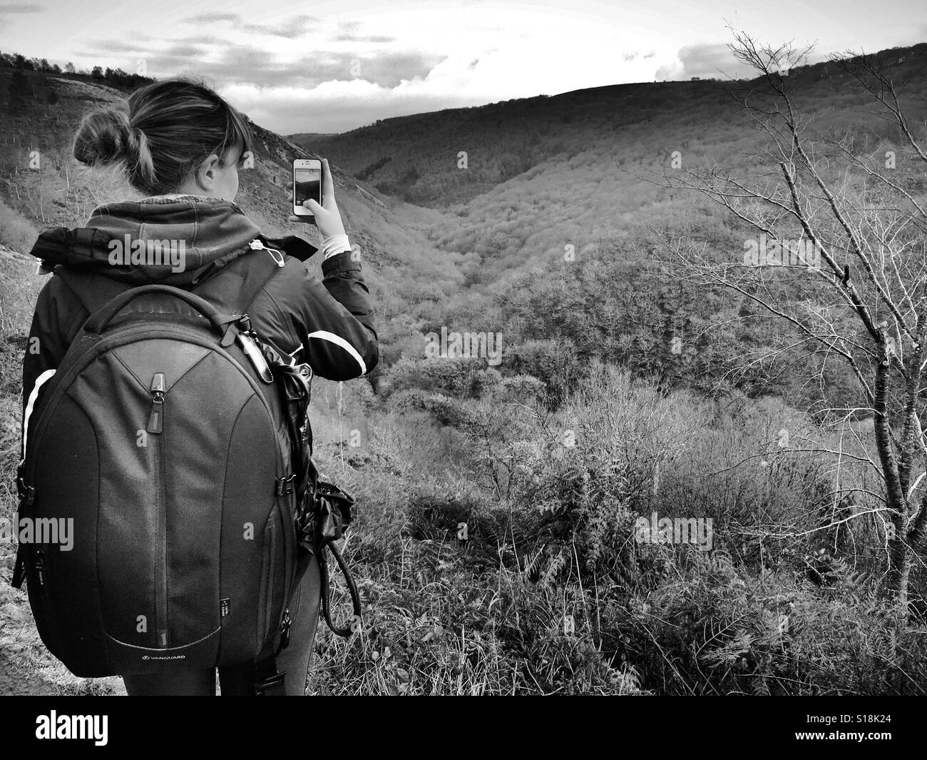 Woman while hiking Black and White Stock Photos & Images - Alamy