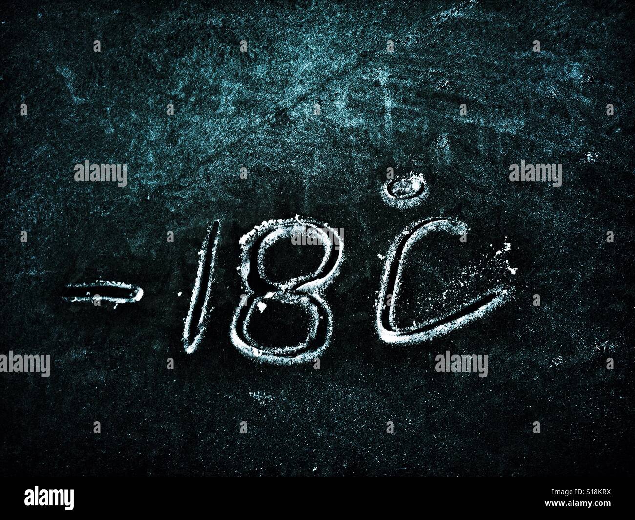 -18 c written in ice - Smartphone Captured Stock Image