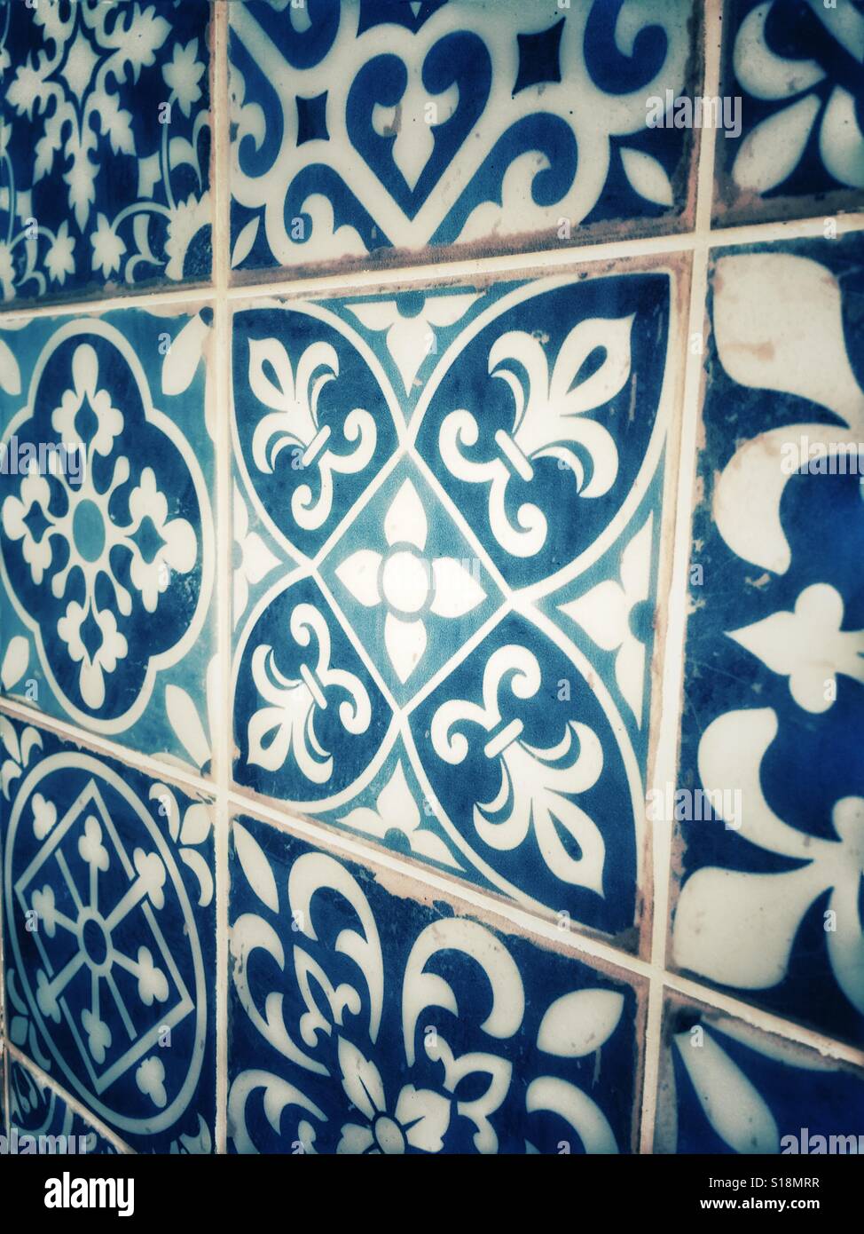 Spanish blue and white tiles adorn a wall in the old town of Alicante, Spain Stock Photo