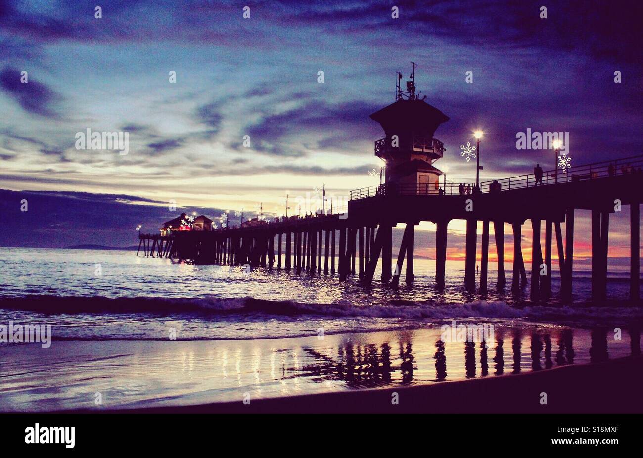 Huntington Beach Pier at dusk Stock Photo Alamy