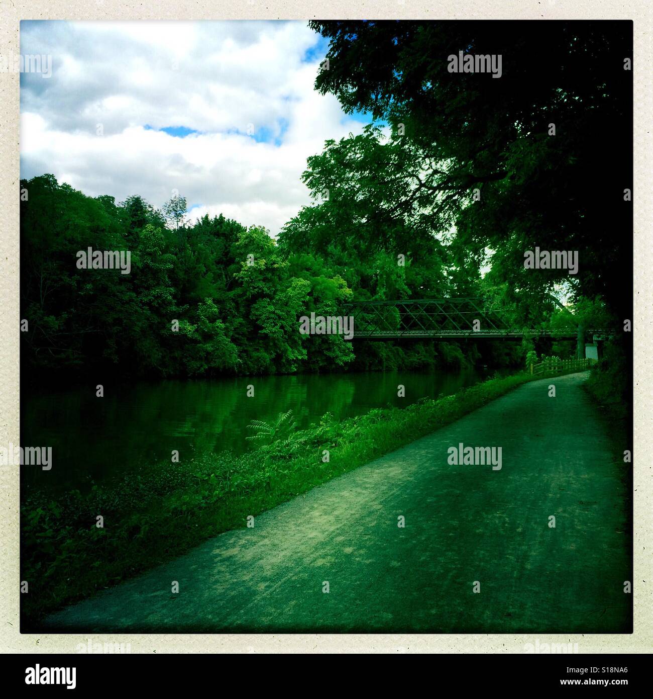 The Erie Canal Towpath running through Pittsford, New York - Smartphone Captured Stock Image