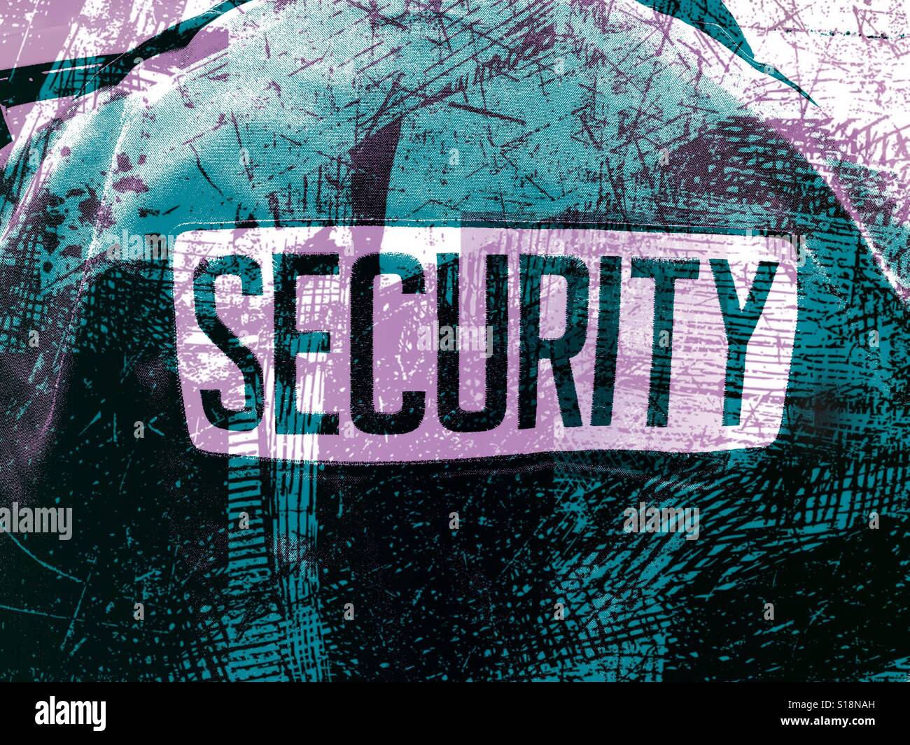 The word SECURITY on a security guard's jacket. Stock Photo