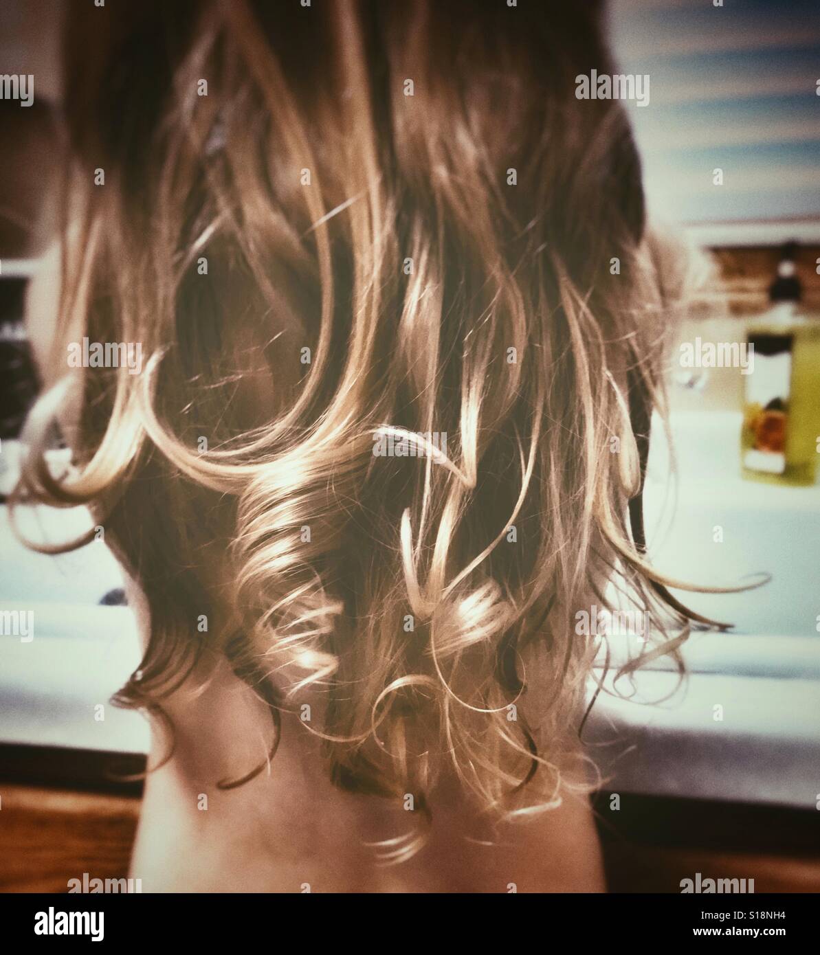 Little girls curly long hair Stock Photo