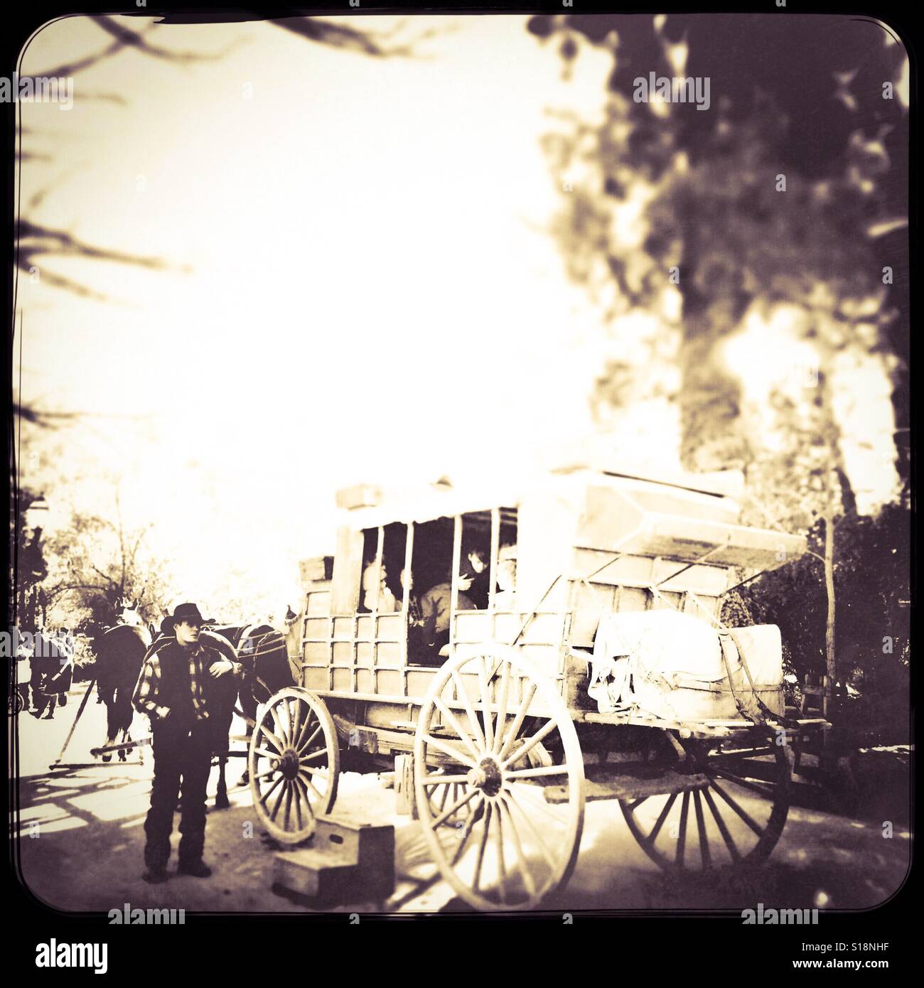 Stagecoach loading passengers on Main Street. Columbia State Historic Park, Columbia, Tuolumne County,  California, USA Stock Photo