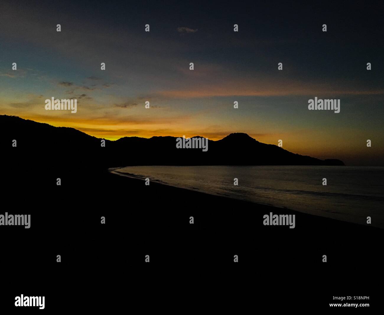 Sunset over the headland in Costa Rica - Smartphone Captured Stock Image