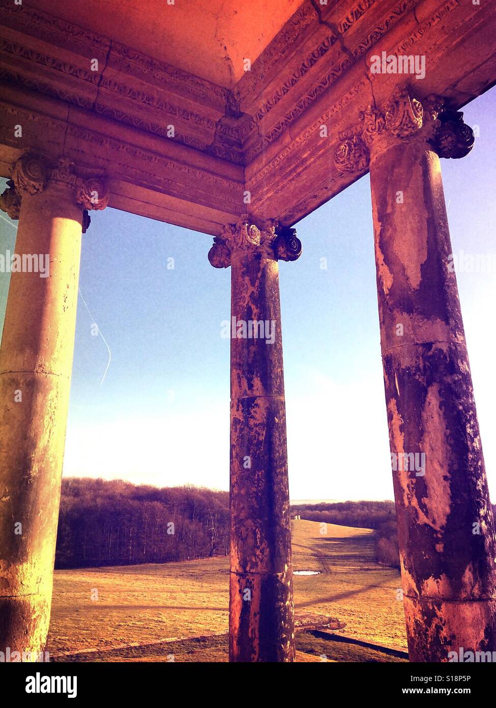 3 pillars supporting a crumbling roof - Smartphone Captured Stock Image