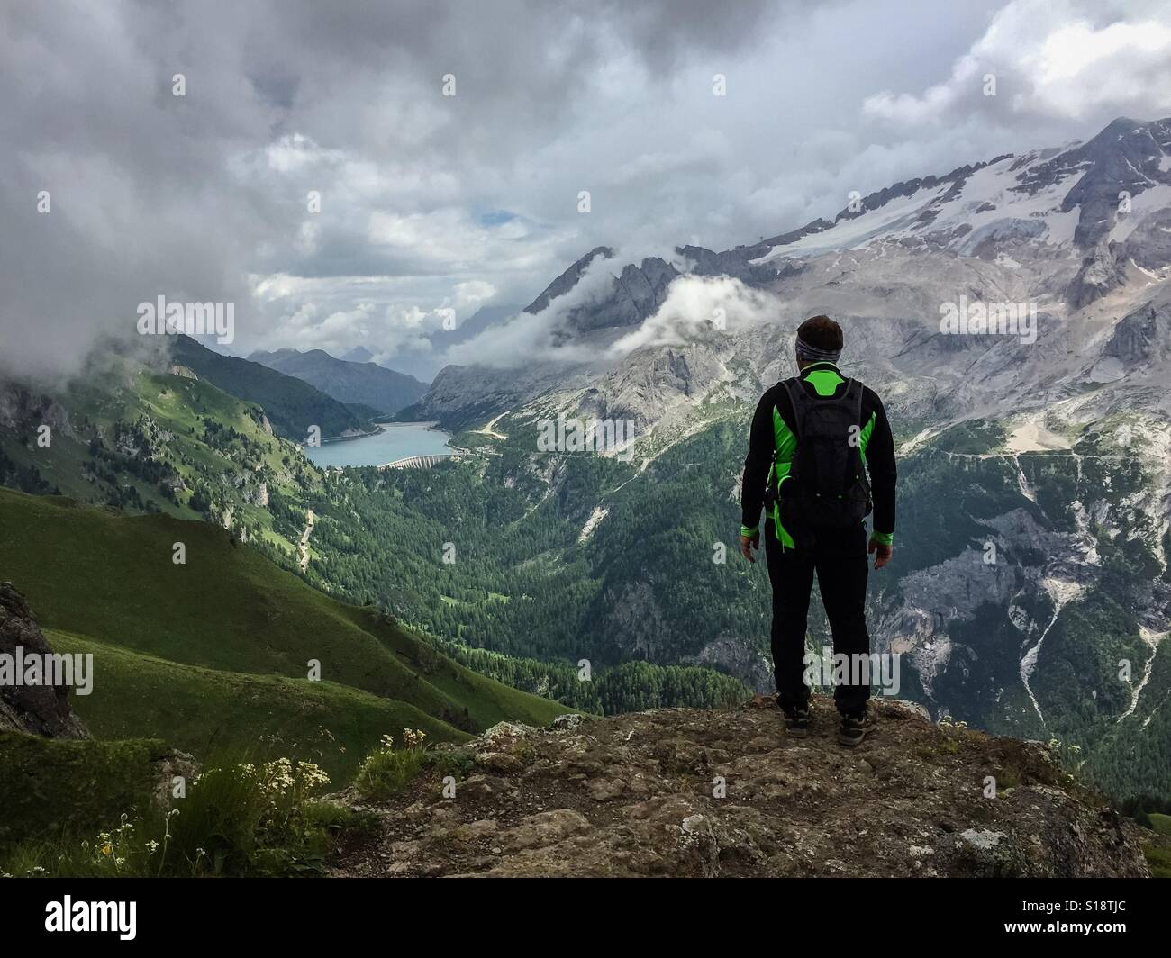 Hiker enjoying a view in the Dolomites, Italy - Smartphone Captured Stock Image